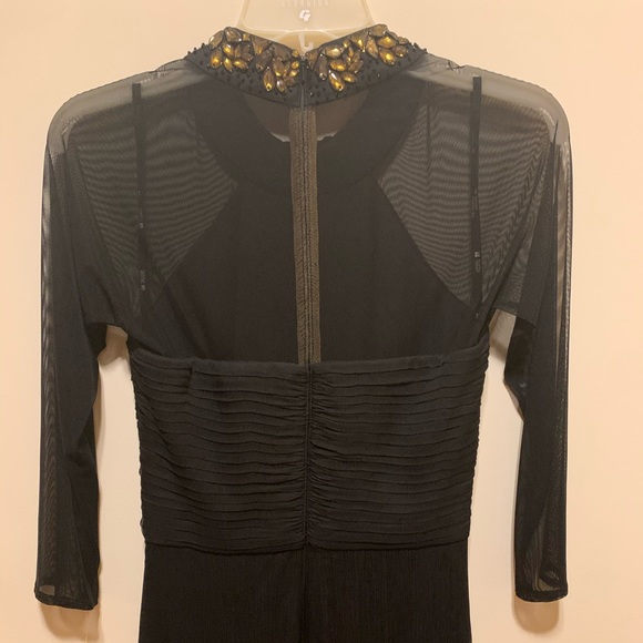 Black gown, long sleeve, stretch sheer sleeves, and rhinestone collar. - Picture 3 of 7